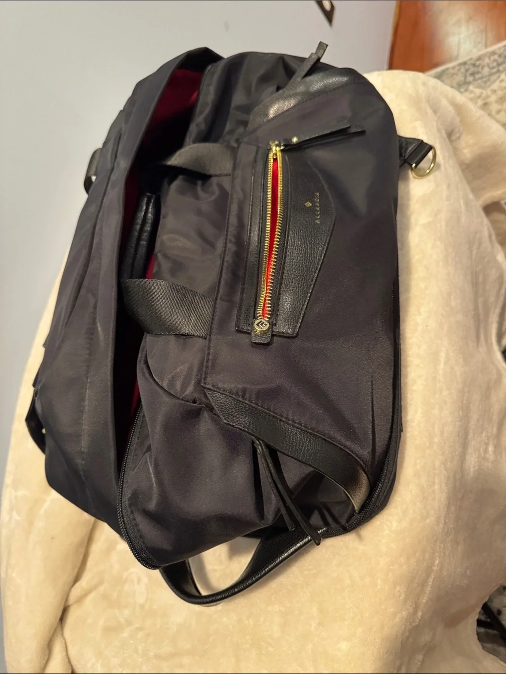 Allancia Peyton black nylon backpack featuring striking gold-tone hardware. NEW